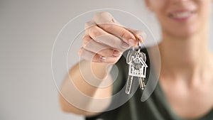 Woman holding new house keys