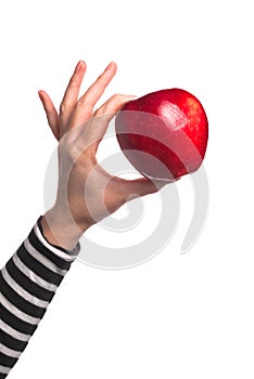 Woman holding organic red delicious apple