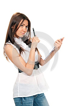 Woman holding pen and a textbook