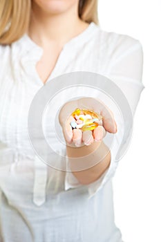 Woman holding pharmaceuticals