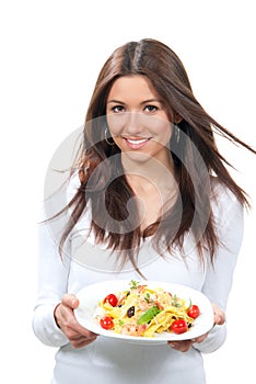 Woman holding plate with macaroni, spaghetti pasta