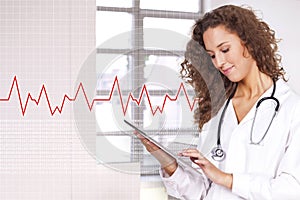 Woman holding a portable computer