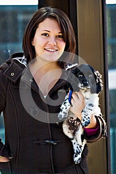 Woman holding puppy