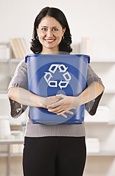 Woman Holding Recycling Basket