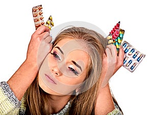 Woman holding remedy, packaging pill and tablet.