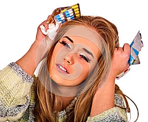 Woman holding remedy, packaging pill and tablet.