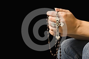 Woman holding rosary. photo