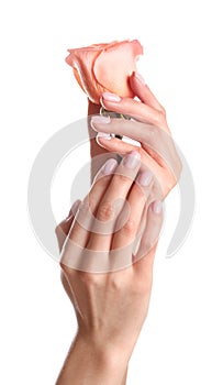 Woman holding rose on white background. Spa treatment