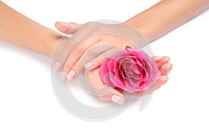 Woman holding rose on white background. Spa treatment