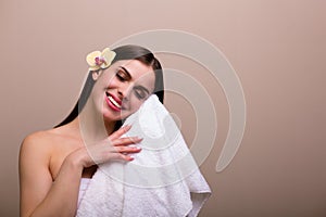 Woman holding a set of bath sponges