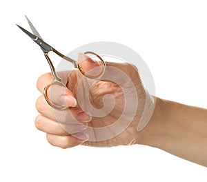Woman holding sewing scissors isolated on white, closeup