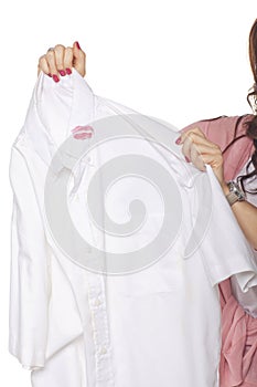 Woman Holding Shirt With Lipstick