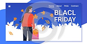 Woman holding shopping bag and autumn leaves black friday banner big sale promotion concept
