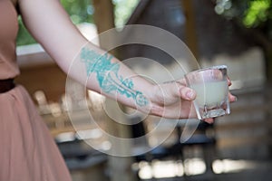 Woman Holding Shot glass