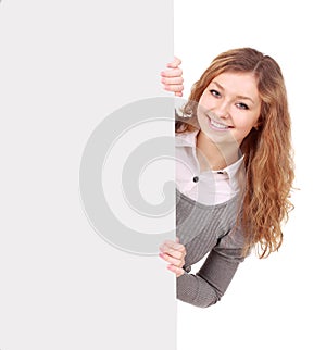 woman holding sign - Portrait of a beautiful woman holding a blank billboard.