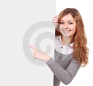 woman holding sign - Portrait of a beautiful woman holding a blank billboard.