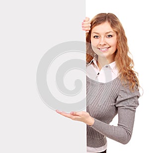 woman holding sign - Portrait of a beautiful woman holding a blank billboard.