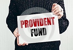 Woman Holding a Sign for Providence Fund