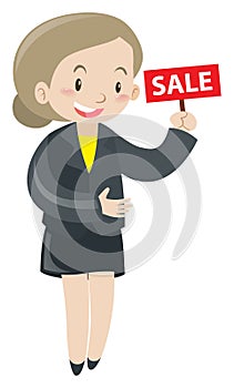 Woman holding sign for sale