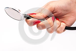 Woman holding stethoscope in hand on white background