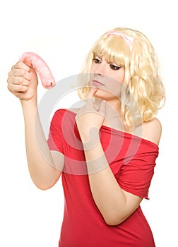 Woman holding a strange pink thing