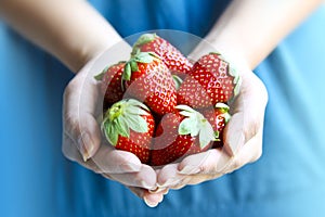 Woman Holding Strawberries