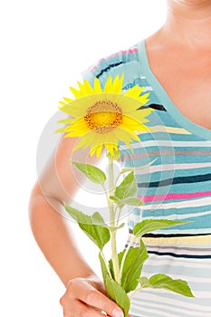 Woman holding sunflower.