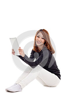 Woman holding tablet computer.