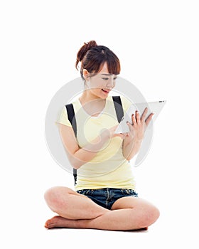 Woman holding tablet computer