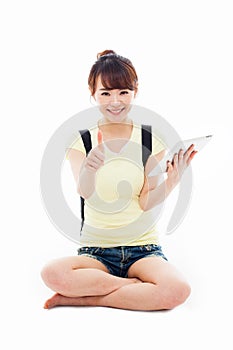 Woman holding tablet computer