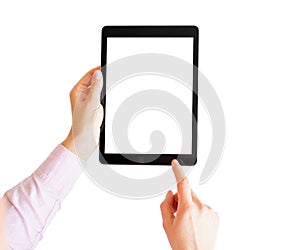 Woman holding tablet and touching screen with finger.