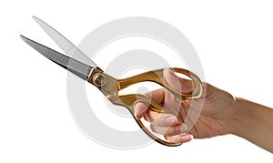 Woman holding tailor`s scissors isolated on white, closeup