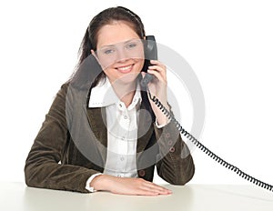 Woman holding a telephone handset photo