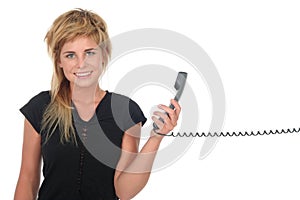 Woman holding a telephone handset