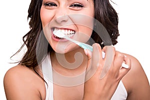 Woman holding a tooth brush