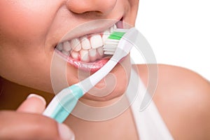 Woman holding a tooth brush