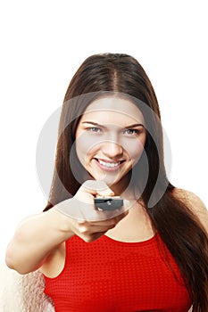 Woman holding TV remote control