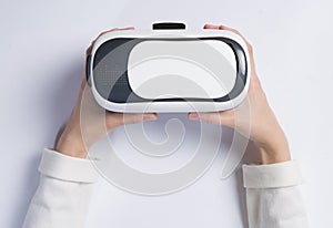 Woman holding VR headset