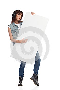 Woman Is Holding White Banner And Pretending Playing the Guitar