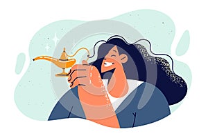 Woman holds aladdin lamp and wants to make wish or summon magical genie from fairy tales