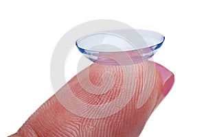 Woman holds a Contact Lens