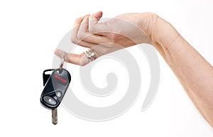 Woman Holds Electronic Car Keys Fingertips