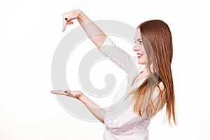 Woman holds empty hand copy space for product