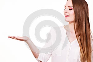 Woman holds empty hand copy space for product