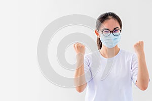 Woman holds a fist to show encourage