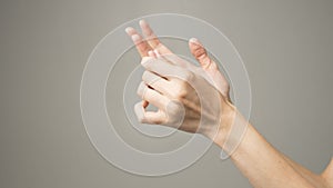 Woman holds her hand - pain concept