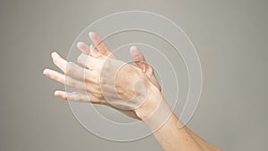 Woman holds her hand - pain concept