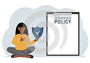 A woman holds an insurance policy sign in his hands. The concept of life insurance, property or natural disasters.