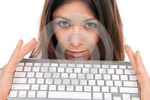 Woman holds keyboard for wireless laptop computer