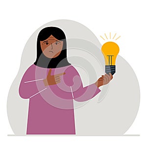 A woman holds a light bulb in his hand. Idea concept, brainstorming, business, thinking, solution, eureka, task, bingo